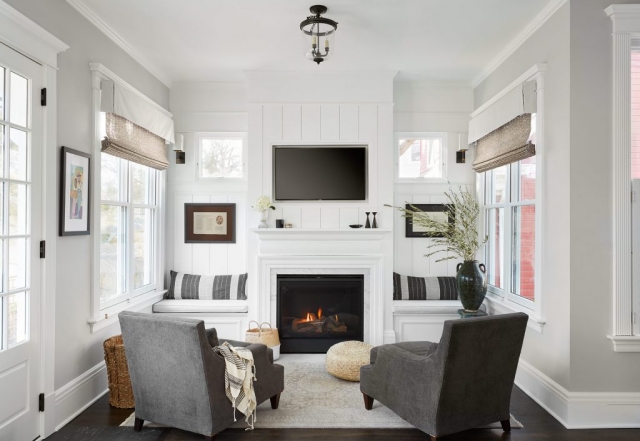 Fireplace with classic style trim and built-in seating