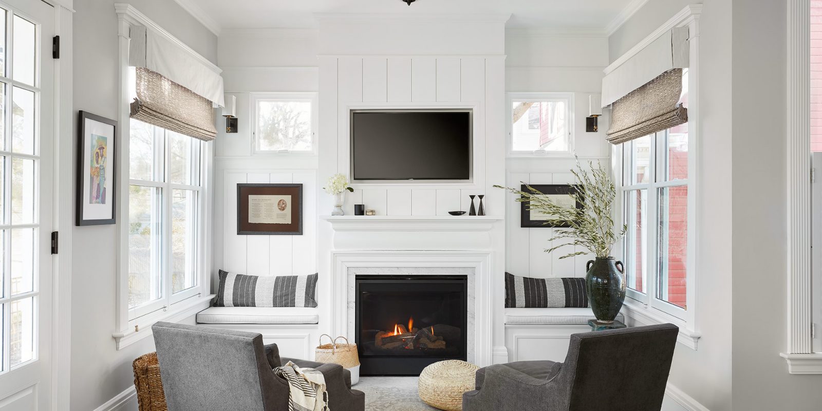 Fireplace with classic style trim and built-in seating